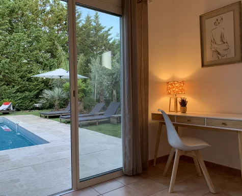 Just steps from the pool, master bedroom